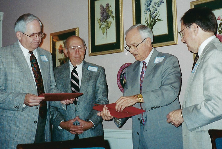 District Superintendents: Rev. Ed Sells (left), Rev. Walter Ellisor, Kent Hall, and Rev. Langdon Garrison